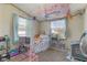 Bedroom featuring a window, carpeted floor, and decor at 220 E Meridian St, Atlanta, IN 46031