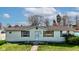 Charming single-story house with tidy landscaping and walkway at 220 E Meridian St, Atlanta, IN 46031