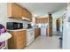 Kitchen featuring all appliances and wood cabinetry at 220 E Meridian St, Atlanta, IN 46031