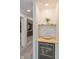 Basement wet bar nook with wine fridge and shelving at 2208 Dudley Ave, Westfield, IN 46074