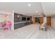 Spacious finished basement featuring a home theater, ample storage, and recreational area at 2208 Dudley Ave, Westfield, IN 46074