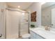 A clean and bright bathroom with a glass-enclosed shower and modern fixtures at 2208 Dudley Ave, Westfield, IN 46074