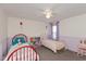 Charming bedroom with two beds, ample space, and playful decor creating a welcoming environment at 2208 Dudley Ave, Westfield, IN 46074