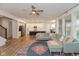 Spacious living room with an open floor plan, plush seating, and a view of the modern kitchen at 2208 Dudley Ave, Westfield, IN 46074