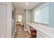 Bright office nook with a Quartz countertop, view to the living room, and hardwood flooring at 2208 Dudley Ave, Westfield, IN 46074
