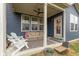 Covered patio with outdoor seating and ceiling fan at 2208 Dudley Ave, Westfield, IN 46074