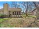 Cozy home featuring a screened porch and a private backyard for outdoor enjoyment at 2214 Van Ness Pl, Indianapolis, IN 46240