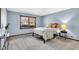 Relaxing bedroom featuring a comfortable bed and bright light from the window at 2214 Van Ness Pl, Indianapolis, IN 46240