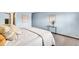 Cozy bedroom featuring carpet, decorative wall hangings, and plenty of light at 2214 Van Ness Pl, Indianapolis, IN 46240