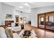 Spacious living room filled with natural light, hardwood floors, and stylish decor at 2214 Van Ness Pl, Indianapolis, IN 46240