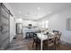 Bright, modern kitchen with stainless steel appliances, white cabinets, and a large island with seating at 2226 N Capitol Ave, Indianapolis, IN 46208