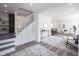 Bright and airy living room open to the dining area with modern decor at 2226 N Capitol Ave, Indianapolis, IN 46208