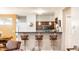 Kitchen bar featuring pendant lighting and contemporary seating at 2316 N Pennsylvania St # 1, Indianapolis, IN 46205