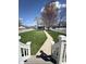 Spacious backyard featuring a large lawn and white picket fence. Perfect for outdoor activities at 2419 N Park Ave, Indianapolis, IN 46205