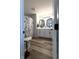 Charming bathroom featuring a double sink vanity, modern fixtures, and decorative shower curtain at 2419 N Park Ave, Indianapolis, IN 46205
