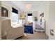 Bright Bedroom with a crib, glider, dresser, and stylish decor creates a warm space at 2419 N Park Ave, Indianapolis, IN 46205