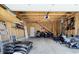 Spacious unfinished garage with exposed beams and ample storage space, ready for customization at 2419 N Park Ave, Indianapolis, IN 46205