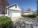 Attached garage with an automatic door, with a view of the lawn at 2419 N Park Ave, Indianapolis, IN 46205