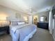 Serene main bedroom featuring a large bed, dresser, and en-suite bathroom access at 2419 N Park Ave, Indianapolis, IN 46205