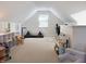 Playroom space featuring a table, shelves, and toys, perfect for activities at 2419 N Park Ave, Indianapolis, IN 46205