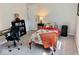 Relaxing bedroom with bed, desk, and shelves providing a comfortable and functional living space at 2605 W Berkshire Dr, Muncie, IN 47304