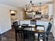 Eat-in kitchen featuring new stainless appliances, countertops and lighting at 2605 W Berkshire Dr, Muncie, IN 47304