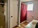 Functional bathroom features a walk-in shower and a window above the sink for natural light at 2715 S 300 E, Anderson, IN 46017