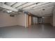 Spacious unfinished basement with exposed pipes and ductwork at 3140 Bonham Dr, Indianapolis, IN 46222