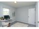 Spare bedroom featuring carpet, a window, and an adjacent closet at 3140 Bonham Dr, Indianapolis, IN 46222