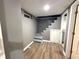 Finished basement with painted walls and recessed lighting, and a staircase with open risers at 3233 N Tacoma Ave, Indianapolis, IN 46218