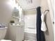 Bathroom featuring a shower-tub combo with vanity at 3233 N Tacoma Ave, Indianapolis, IN 46218