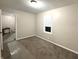 Bedroom with carpet and neutral walls, flooded in natural light at 3233 N Tacoma Ave, Indianapolis, IN 46218