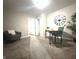 Sitting room with carpet, and neutral walls, plus a desk space by the door at 3233 N Tacoma Ave, Indianapolis, IN 46218