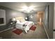 Relaxing main bedroom featuring neutral walls, ceiling fan, ensuite and carpet at 3233 N Tacoma Ave, Indianapolis, IN 46218