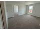 Comfortable carpeted bedroom with a window providing natural light at 3315 Godby Dr, Sheridan, IN 46069
