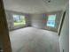 Unfinished bedroom with natural light from two windows, ready for personalization and décor at 3315 Godby Dr, Sheridan, IN 46069
