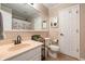Clean bathroom with a large mirror, peach colored vanity, and a shower/tub combo at 3510 Oak Tree Cir, Indianapolis, IN 46227