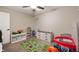 Neutral bedroom with a ceiling fan, neutral paint, and carpeted floors at 3510 Oak Tree Cir, Indianapolis, IN 46227