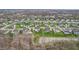 Peaceful community aerial view with ponds, mature trees, and well-maintained landscaping throughout at 3665 Conifer Dr, Zionsville, IN 46077