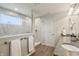 Bathroom featuring double sink, granite countertops, tiled shower and modern fixtures at 3665 Conifer Dr, Zionsville, IN 46077