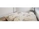 Cozy bedroom features carpet, a bed with floral bedding, and a window at 3665 Conifer Dr, Zionsville, IN 46077