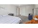Cozy bedroom with carpet, neutral walls, comfy bed, and furniture at 3665 Conifer Dr, Zionsville, IN 46077