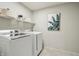 Functional laundry room with modern appliances and ample storage space at 3665 Conifer Dr, Zionsville, IN 46077