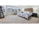 Bright, spacious bedroom with multiple windows, neutral colors, and stylish furniture at 3665 Conifer Dr, Zionsville, IN 46077