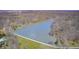 Stunning aerial shot of lakeside homes, providing beautiful waterfront views and tranquil living at 3753 Whippoorwill Lake S Dr, Monrovia, IN 46157