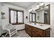 Traditional-style bathroom featuring a double sink vanity and decor at 3753 Whippoorwill Lake S Dr, Monrovia, IN 46157