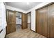 Bright bedroom features wood-look floors, light walls and closet at 3753 Whippoorwill Lake S Dr, Monrovia, IN 46157