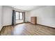 Bedroom features hardwood flooring, natural light, and wood dresser at 3753 Whippoorwill Lake S Dr, Monrovia, IN 46157