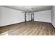 Large bedroom with hardwood floors, ceiling fan and two closets with wood trim at 3753 Whippoorwill Lake S Dr, Monrovia, IN 46157