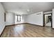 Spacious bedroom features hardwood floors, a ceiling fan, and a window providing natural light at 3753 Whippoorwill Lake S Dr, Monrovia, IN 46157